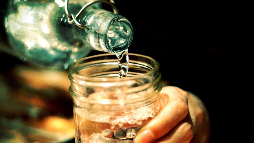 Pouring clean water into a glass